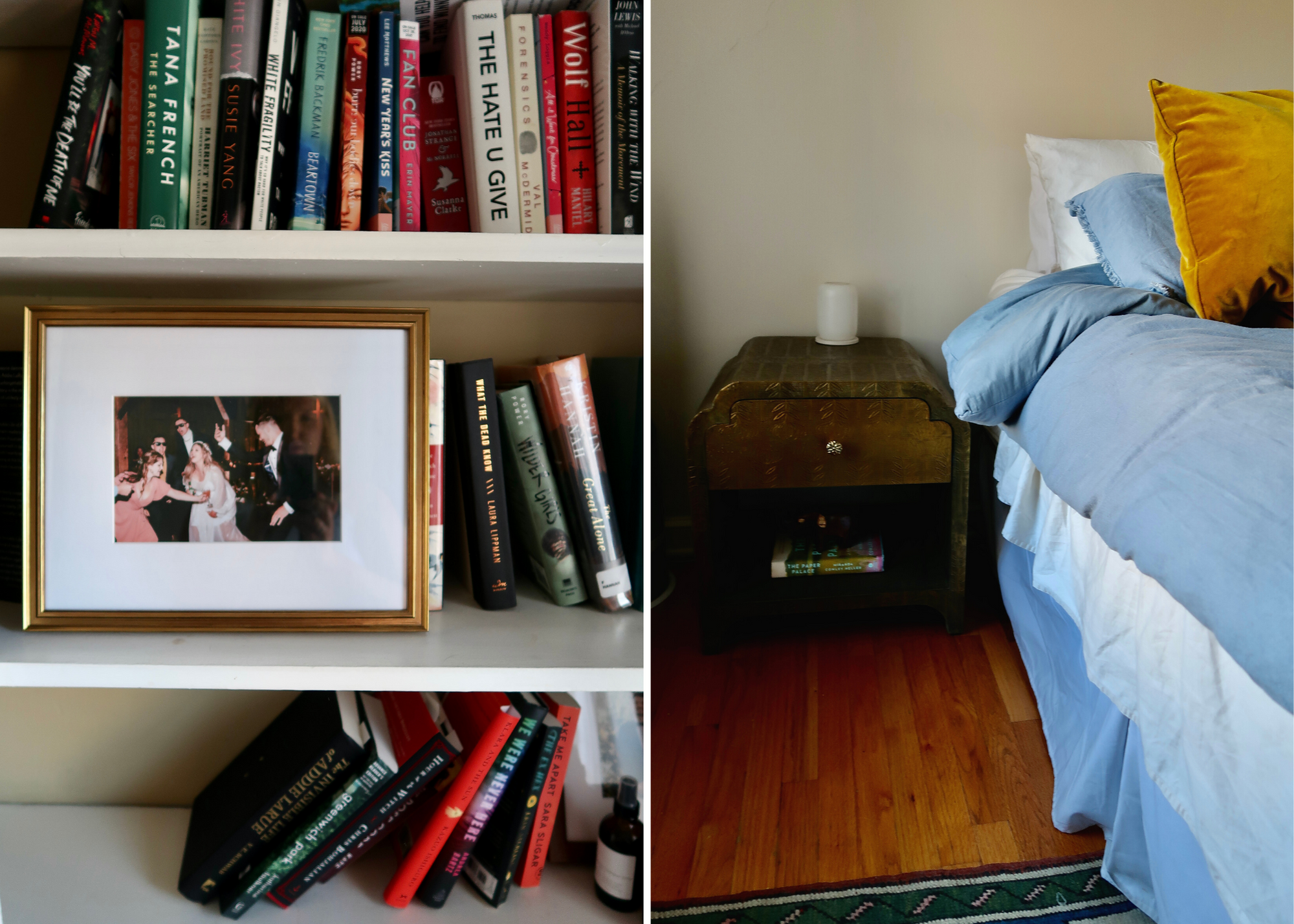 Bedroom corner with a bed, bedside table, bookshelves, framed photograph, and patterned rug.